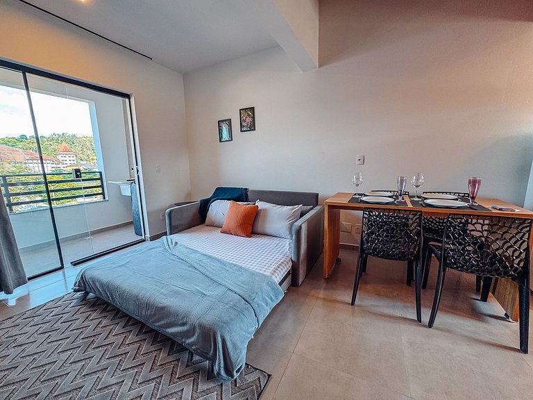 Centro | Loft para até 4 pessoas com vaga garagem