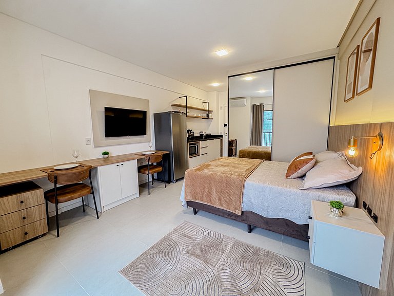 Flat confortável com garagem | Sta Terezinha