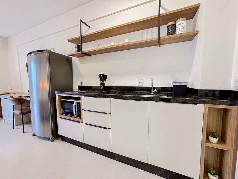 Flat confortável com garagem | Sta Terezinha