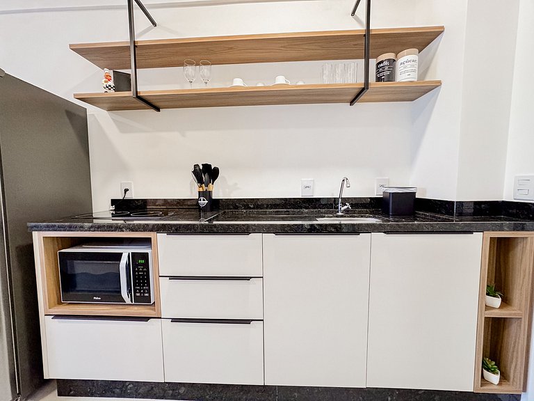 Flat confortável com garagem | Sta Terezinha