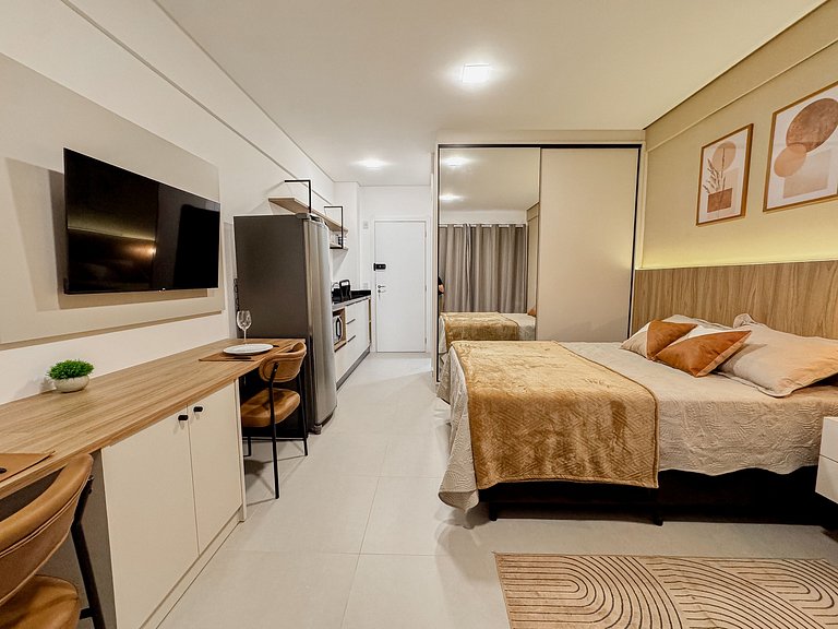 Flat confortável com garagem | Sta Terezinha